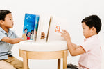 Load image into Gallery viewer, Two children reading the bilingual Korean English children’s book My Favorite Gift and My Beautiful Earth by Spark Collection, showing inside pages with colorful illustrations and Korean–English text.
