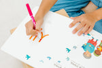 Load image into Gallery viewer, Inside lift‑the‑flap page from the bilingual Korean–English children’s book Pay It Forward showing Korean Hangul and English text for early readers and a child tracing the Korean Hangul to learn how to write using a dry-erase marker and its dry-erase writeable pages.
